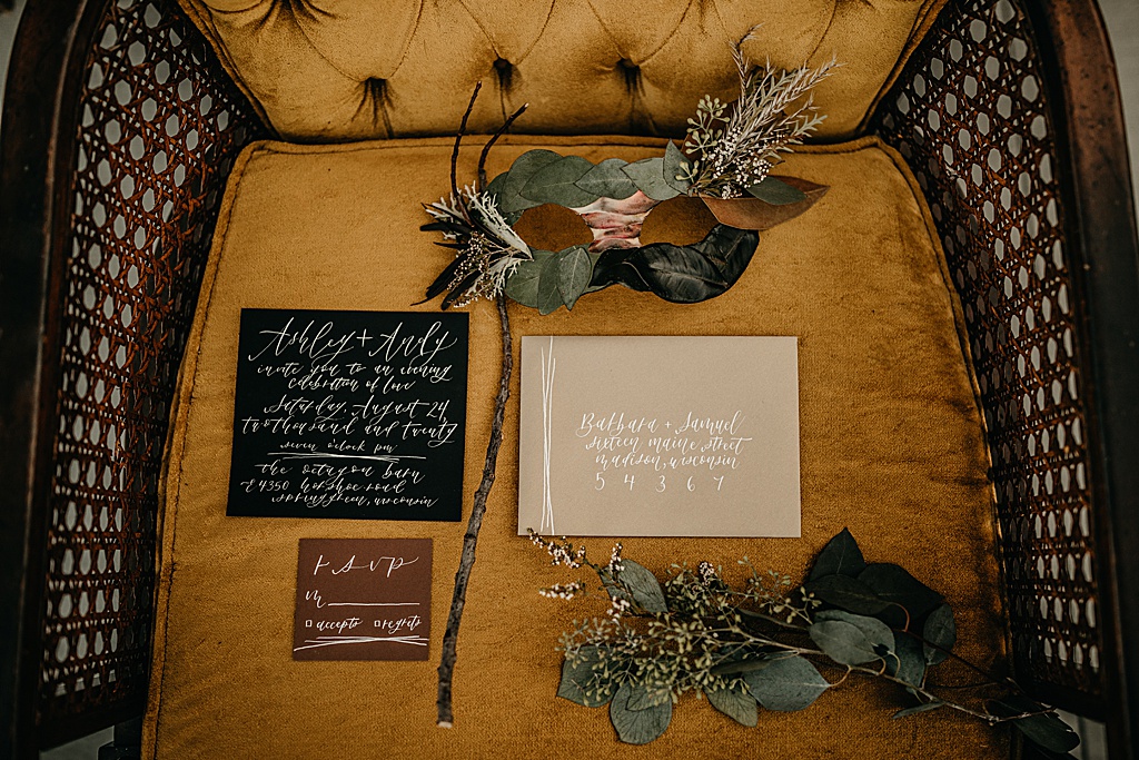 gothic wedding invitations on vintage chair